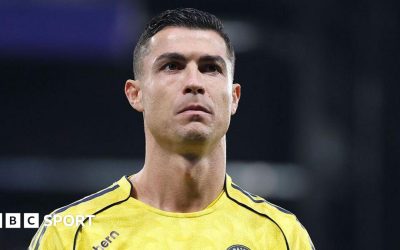 Head-and-shoulders image of Cristiano Ronaldo in a yellow Al-Nassr shirt