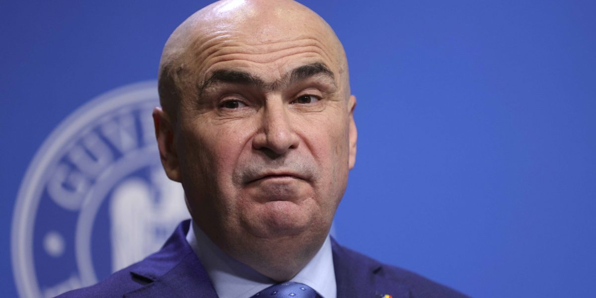 E Bolojan „Ilie Sărăcie”? Răspunsul consilierului BNR, pe banii statului