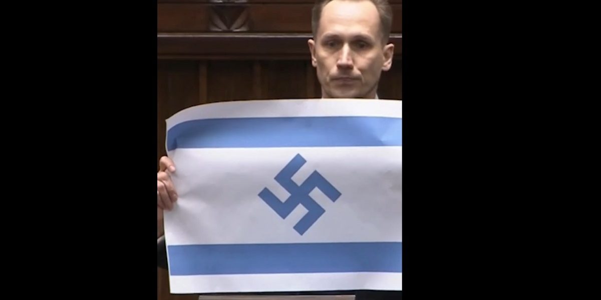 Deputat de extremă dreapta, gest șocant în Parlamentul Polonez: steag antisemit